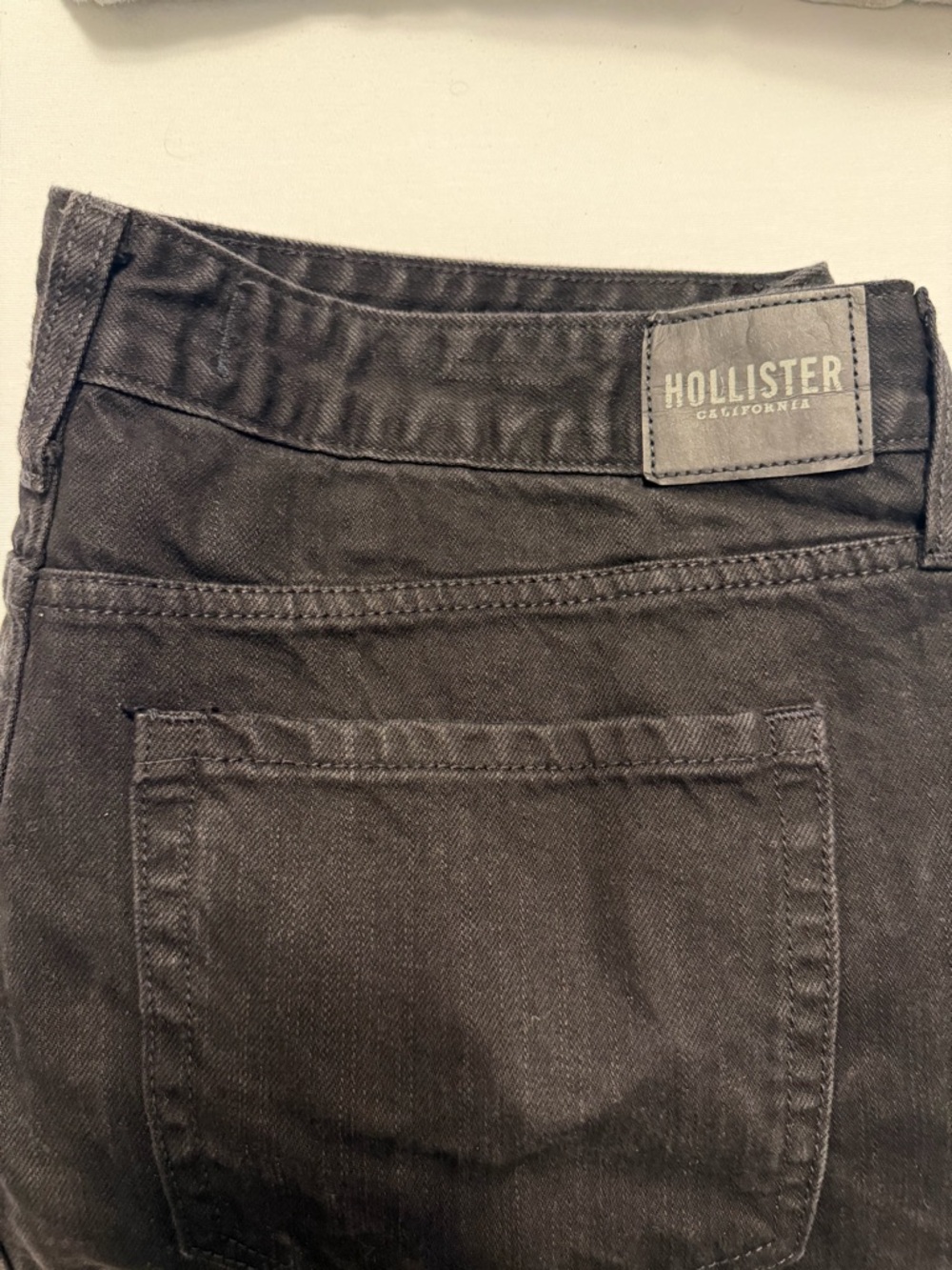 Hollister Women's Slim Black Jeans with Leather Logo Patch. Never worn.